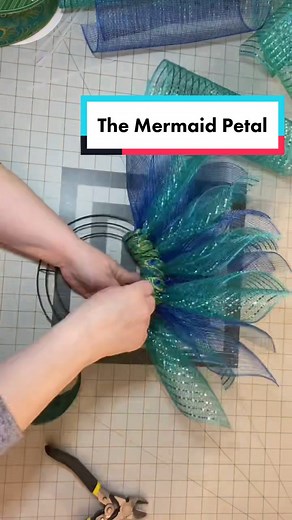 The Mermaid Petal Wreath, full tutorial is on my YouTube channel. #mermaidtiktok #wreathmaking #wreathsbyjulie #wreathmaker #dollartreediyprojects