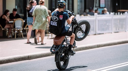 Large group takes e-bike tour of Sydney