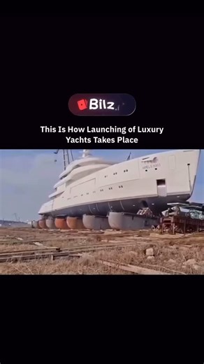 Knowledge Universe on Instagram: "This is how launching of luxury yachts takes place-slow, controlled, and incredibly precise. First, the yacht is carefully moved from the construction hall onto a special platform or cradle that supports its weight evenly. Then, using cranes, hydraulic lifts, or a slipway, the massive vessel is guided toward the water without letting it tilt or twist. Once it touches the surface, the yacht gently floats free, completing the transition from land to sea. It’s a mi