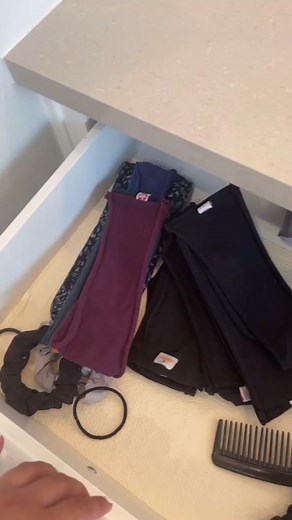 Professional Housekeeper Going the Extra Mile Organizing Client's Drawers