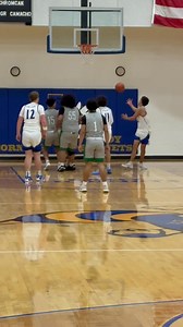 Louise senior Chris Ochoa (2) grabs a rebound and heaves a shot at the buzzer to end the first period as Bloomington leads 14-4 in the district opener for both squads. | Wharton County Leader-Journal