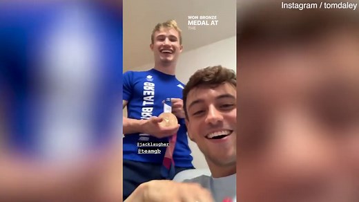 Tom Daley messes around with GB medal winning diver Jack Laugher