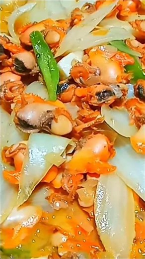Stir-fried razor clams with chili sauce are absolutely delicious!