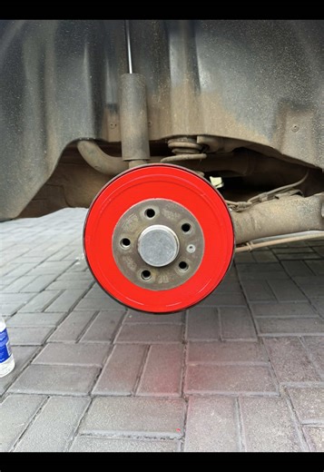 Red Brake Calipers and Drum Installation on VW Polo