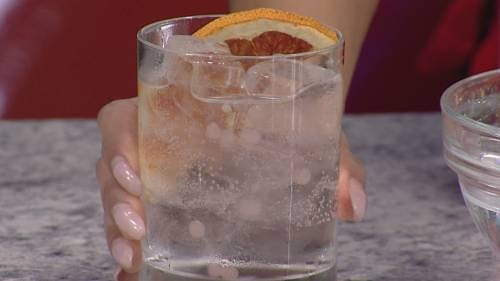 Mixing drinks with Science World’s robotic bartender