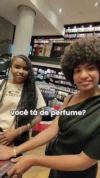 Testing the Attracione Men perfume in a library.