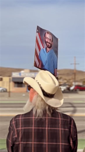 StuartPalley on Instagram: "Anti-regime protest, downtown Joshua Tree. About 200 demonstrators gathered on the sidewalk at Park Ave and 62 and held signs, sang chants, and collected food and supplies for families afraid to leave their homes in the area. Cars on the highway honked in support with some cars flipping off the protestors."