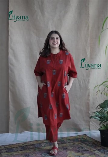 Fabric: Soft, breathable cotton Color: Deep ruby red Design: All-over minimal ethnic pot-print motifs Top: Straight-cut kurti Round neck with a short button placket 3/4th roll-up sleeves Comfortable loose fit Side pockets for added convenience Bottom: Matching red cotton trousers Relaxed fit for everyday comfort Footwear: Paired with simple red flat sandals for a complete ethnic-casual look Best For: Daily wear, casual outings, office wear, and summer comfort | Liiyana