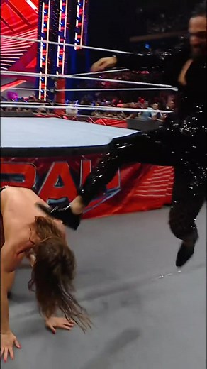 A vicious attack from #SethRollins to @RIDDLE on #WWERaw!