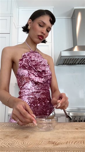 REVOLVE on Instagram: "Because there’s no such thing as being overdressed 🪩🍬 @naraaziza makes homemade candy while wearing the @loversfriendsla Lilium Gown 💖 Save this recipe + shop her look now, exclusively at the link in bio"