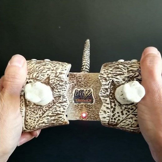 Opening the remote control on the 2000 Animal Planet Remote Control TRex