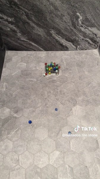 Testing the Slope of a Shower Drain for Proper Drainage