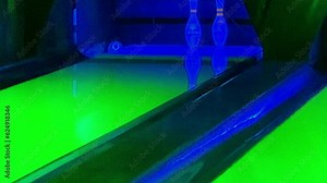 Bowling. View of the bowling alley and the moving ball