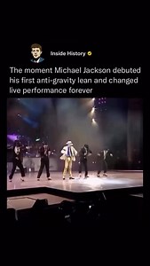 When Michael Jackson performed his legendary anti-gravity lean live for the first time, the world watched in awe! 🌖🚶 It happened during his Dangerous World Tour in the early 1990s, as he and his dancers leaned forward a full 45 degrees during Smooth Criminal—perfectly balanced, seemingly defying the laws of physics. Fans had already seen the move in the Smooth Criminal music video, but witnessing it live—without camera tricks or edits—felt like witnessing real magic. Behind the illusion were s