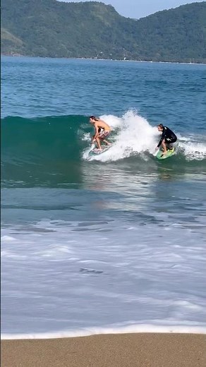 Sharing a perfect skimboard wave!