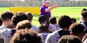 LSU head football coach Brian Kelly getting in sync with his players