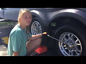 HOW TO CHANGE A TIRE WITHOUT A JACK