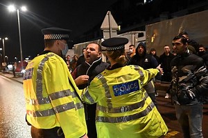 Angry truck drivers stranded in southern England scuffle with police