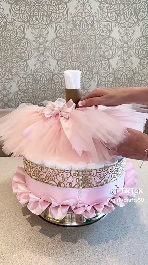 UPDATED TUTORIAL FOR MY PRINCESS TUTU NAPPY/DIAPER CAKE #nappycake #foryoupage #nappycakes #diapercake #tutu #princesscake #tiara #pinkbows #bows #babygift #diybabygift #headband #babyshowergift #babyshower #babyshowerideas #babygirl #princess