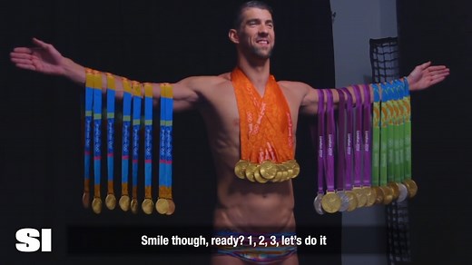 Michael Phelps posing with all TWENTY-EIGHT of his Olympic medals is the ultimate flex 🐐 | Sports Illustrated