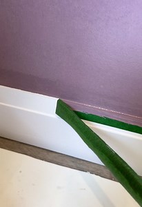 A Different Way to Install and Finish Baseboards (Does it Work?!) … You guys always tell us we’re doing things the “wrong” way… so this time, we tried it your way. ... In terms of installing the baseboards we did it OUR way using —glue nails, pre-caulking for squeeze-out for a clean sealant line! ... That's where we changed gears and mixed up the order of operations as requested: painting first, taping (yes, taping), and even sealing the edge to avoid bleed. And somehow… it all worked fine! ...