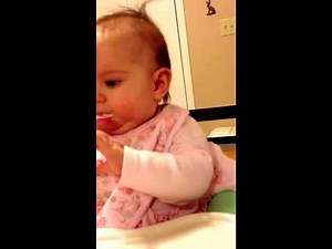 First time eating solid food! Super cute baby, eating rice cereal for the first time!
