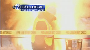 Explosion sends manhole cover flying