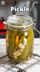 Arti Rout (Maple Kitchen) on Instagram: "Easy Cucumber Pickle This easy cucumber pickle is crunchy, tangy, and takes just minutes to make! 🥒 Perfect as a side, in sandwiches, or on top of rice bowls. No fancy stuff—just simple, fresh, and delicious! Ingredients : 7 cucumber, 6 garlic pods, 5 sliced ginger, 5 green chili, dill leaves, 10 chickpea, 100 ml vinegar, salt, water #CucumberPickle #QuickPickle #EasyRecipe #SummerPickle #HomemadePickle #PickledCucumber #NoCookRecipe #KitchenHack 