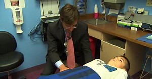 Dentist says controversial restraint technique can help soothe younger patients