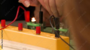 Testing an Electronic Circuit Board in a Physics Science Lesson at School