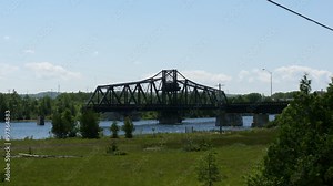 Little current swing bridge time lapse boat passing. The bridge connects manitoulin island and goat island 4k UHD
