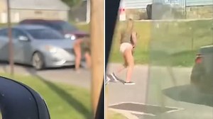 Moment woman seen defecating on another driver's car amid road rage incident