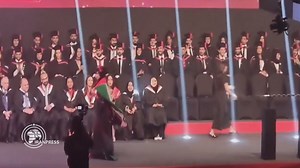 Bahraini Student Raises Palestinian Flag at UK Graduation Ceremony
