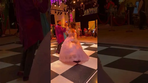 Couple Dancing at Lavish Masquerade Ball