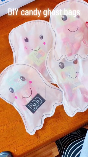 DIY Candy ghost bags! Super easy craft, costly, & your kids will love it. I explain step by step how to make these in this short clip! You only need a few supplies! #diyhalloween #ghostcraft #kidshalloween #halloweencrafts #momlife #elementaryschool #holidaycrafts #easycraft #parchmentpaper