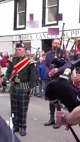 Close up with Forres and District Pipe Band, watching the tenor drummers, as the band played Scotland the Brave into the Rowan Tree. This was during the Toun Mercat (Town Market) on Friday 7th June 2024 as the band, led by Drum Major Mike Munro and Pipe Major Johnathan Scott, entertained crowds on the High Street in Forres. The mercat is the highlight of the Scottish Week, which happens once every three years in June and is a celebration of all things Scottish. This year Scottish week included M