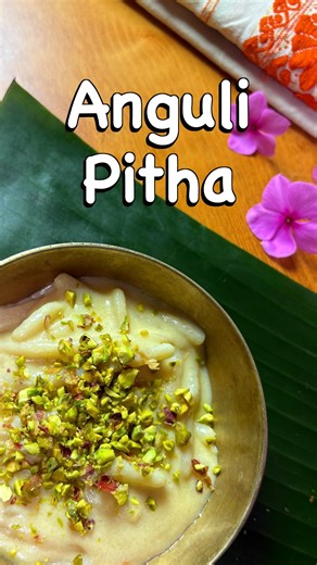 Kozmic Kitchen | Clean eating recipes | Gardening inspo on Instagram: "Anguli Pitha A traditional Assamese dessert named after its beautiful finger-like shape (Anguli = finger). In this video, I share my special homemade version created for the joyous occasion of Magh Bihu. This unique dessert, one of many types of pithas that Assam has, is a celebration of Assamese culture, warmth, and festive flavours – simple, soulful, and so so delicious! The Assamese Ras Malai 🫶 FULL RECIPE : 1. Mix 2 cups