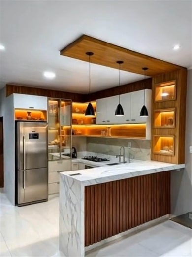 Esse modelo de cozinha americana com balcão moderna é ideal para quem busca inspirações de cozinha com balcão ou cozinha moderna com bancada Confira neste perfil mais modelos de cozinha americana com ilha ideais para você que busca ideias de cozinha com ilha, cozinha com balcão, cozinha planejada ou cozinha com bancada. Veja 30 Plantas baixas de casas com medidas na bio. #cozinhaamericana #cozinha #cozinhamoderna #cozinhaorganizada #cozinhaplanejada