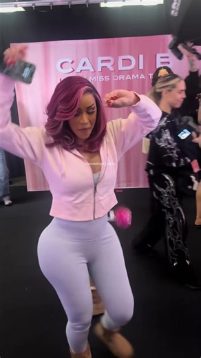 Kulture Blows Kisses Backstage with Cardi B
