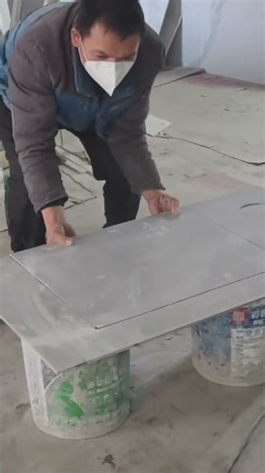 the process of installing ceramic tiles on the walls in the room near the window #construction