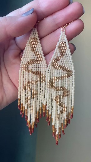 Corra the Serpent Goddess of Ireland earrings in cream 🤍 #handbeadedearrings #folkart #serpentgoddess #celticwitch #paganthings #beadedartwork #serpentfolklore