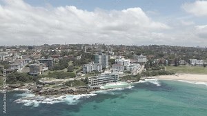 Panorama Of Bondi Suburb With Hotels, Beach And Coastal Walk At Daytime In Summer - Bondi Beach And Bondi Icebergs Pool In NSW, Australia. - aerial