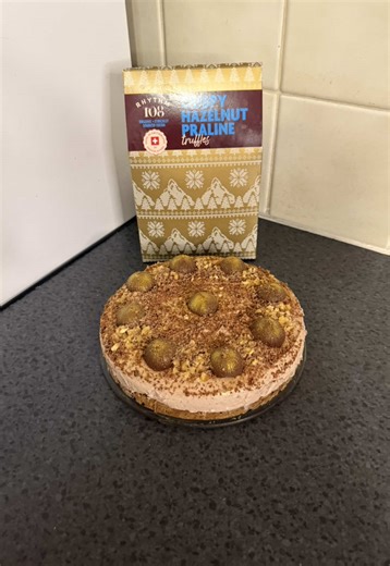 Vegan, Gluten & Dairy Free Hazelnut Praline Cheesecake! After my mum enjoying the biscoff one (to the point of attempting to steal my dad’s), I was to make a Ferrero Roche style… but typical NI & it’s decided to snow. No trip to spar for the regular philidelphia, having plenty of the plant based one, I decided to made a version I could enjoy too! 😉 Ingredients: The base -135g @Rhythm 108 - Swiss Chocolate Hazelnut Chocolate Chip Biscuit -90g schar digestives -100g flora light The filling -300g 