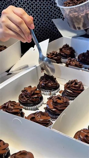 GULA Cakery on Instagram: "GC Matilda Chocolate Cupcake memang level lain sedap dia! Because, our chef patronne @arieniadriena sentiasa give 200% to ensure its perfect! 😋❤️ Moist gila, fudgy, and packed with rich chocolatey goodness the kind that melts instantly and makes you close your eyes because ya Allah sedapnya 🤤💛 And guess what… pre-order is opening this monday for our cupcake version! Are you ready for this chocolate madness? COMMENT YES to order below and we will reach out to you! 😍