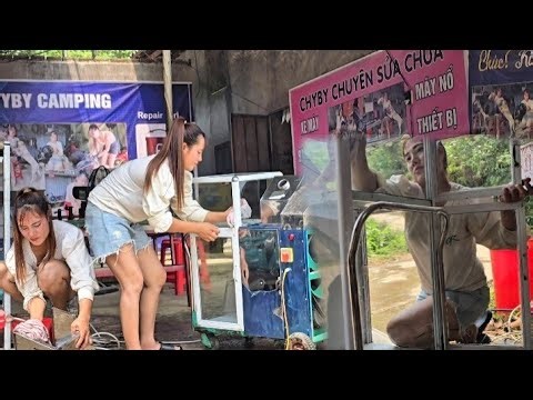 During the hot summer, the girl repaired the sugarcane juicer to quench her thirst.