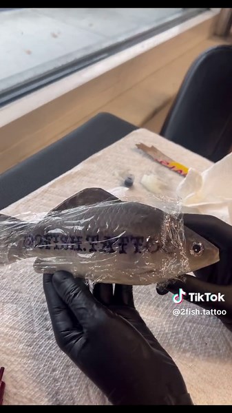 tattooing a 100% real fish #tattoo #tattooartist #sticker