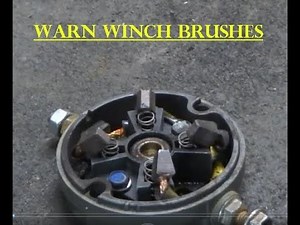 Warn winch assembly of brushes