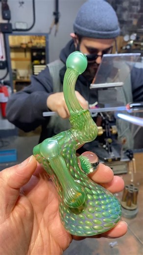 Witch DR. on Instagram: "@dr.treso picked up a script of Chromium from @lilisglass and turned it into a triple dose. Silver & Gold Fume Chromium Snorkel Bub with Ghosted Chromium accents along with a Silver Fume & Chromium Cob and the same on the flower implosion pendent all fresh from the kiln today! Some of the last he’ll ever make up here at 109 Lafayette St!"