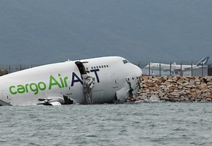 Cargo plane slides off runway in Hong Kong, two killed