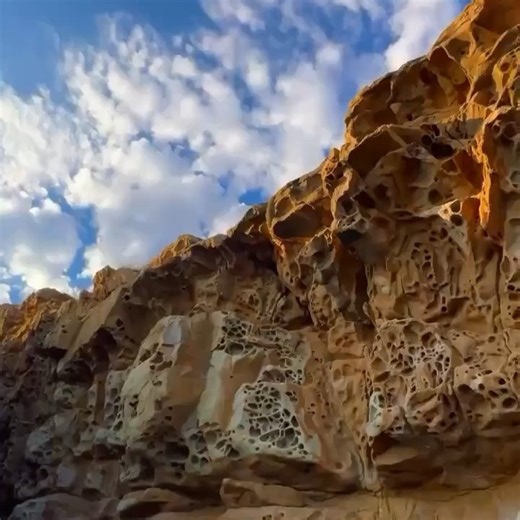 Cheese Rock is a stunning natural monument located on the Black Sea coast of Crimea in the village of Malorechenskoye, near Alushta. The rock earned its name from its porous surface, which features numerous cavities, holes, and rounded niches. | Wonders Cities